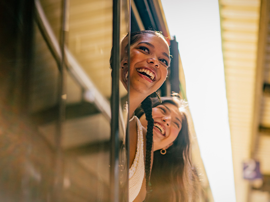women-happy-smiling-outside-4-3-544x408px
