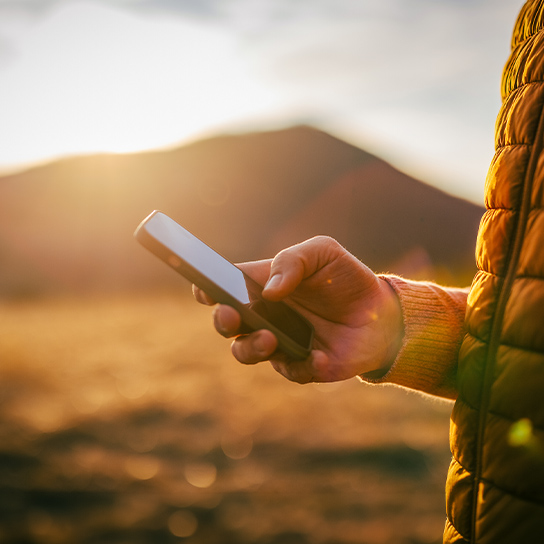 man-using-phone-outside-1-1-544x544px